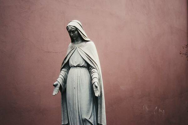 Statue of the Blessed Virgin Mary looking contemplative