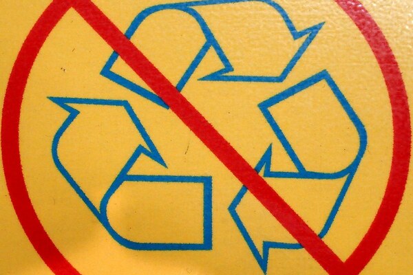 Recycling symbol crossed out