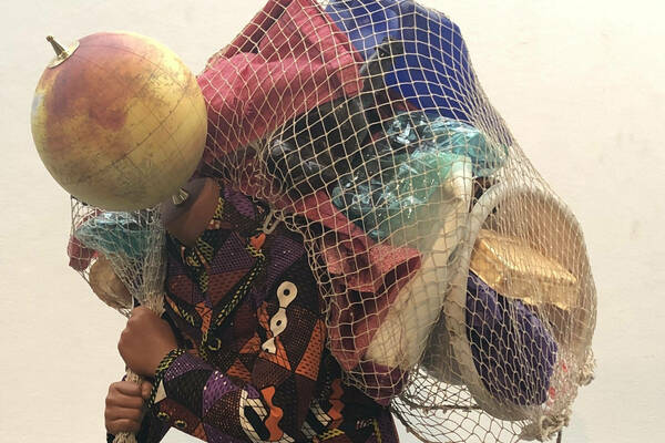 Cropped image of Yinka Shonibare's mannequin, "Earth Kid (Boy)"