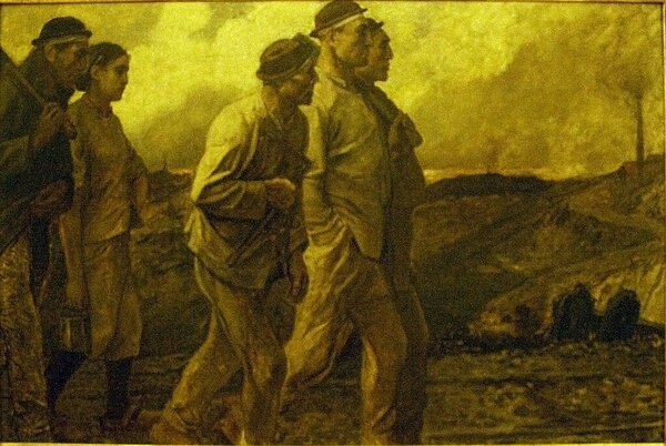 a group of miners walking to work in the mines